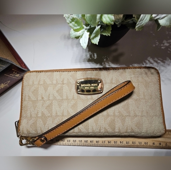 Michael Kors Handbags - EUC Michael Kors Vanilla MK Monogram Travel Zip Continental Wallet / Wristlet